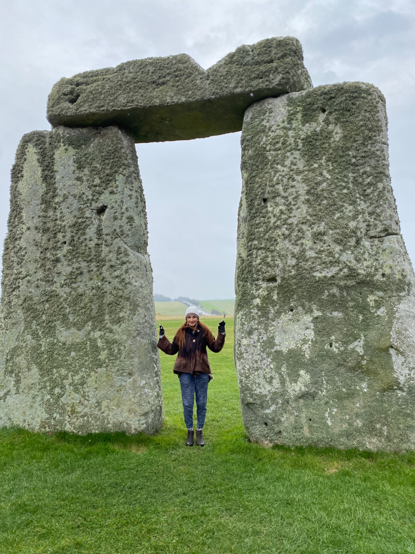 Cathy standing within Stonehenge